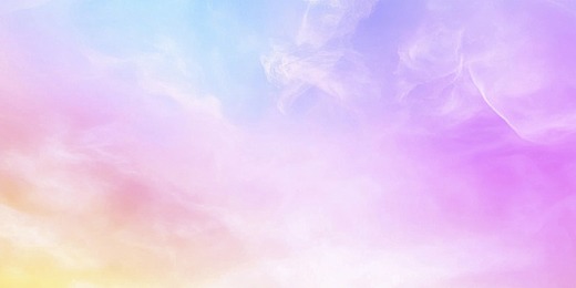 Iridescent ripples of a yellow, pink and blue cloud